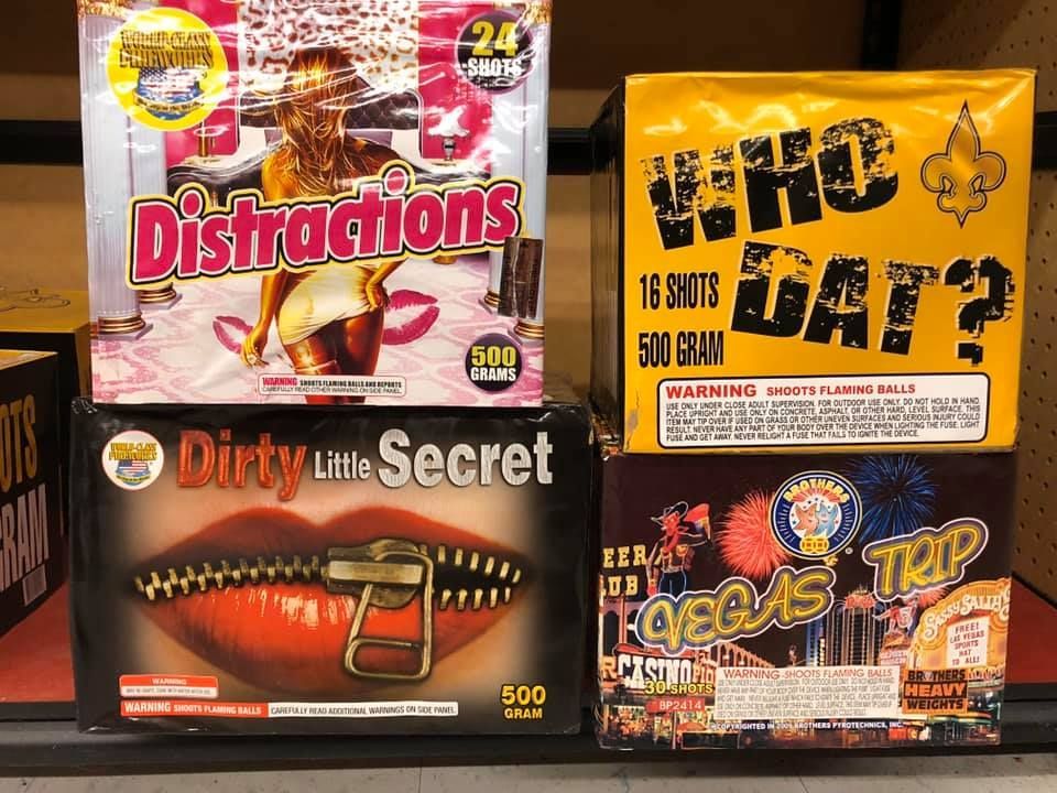 Several boxes of fireworks are stacked on top of each other