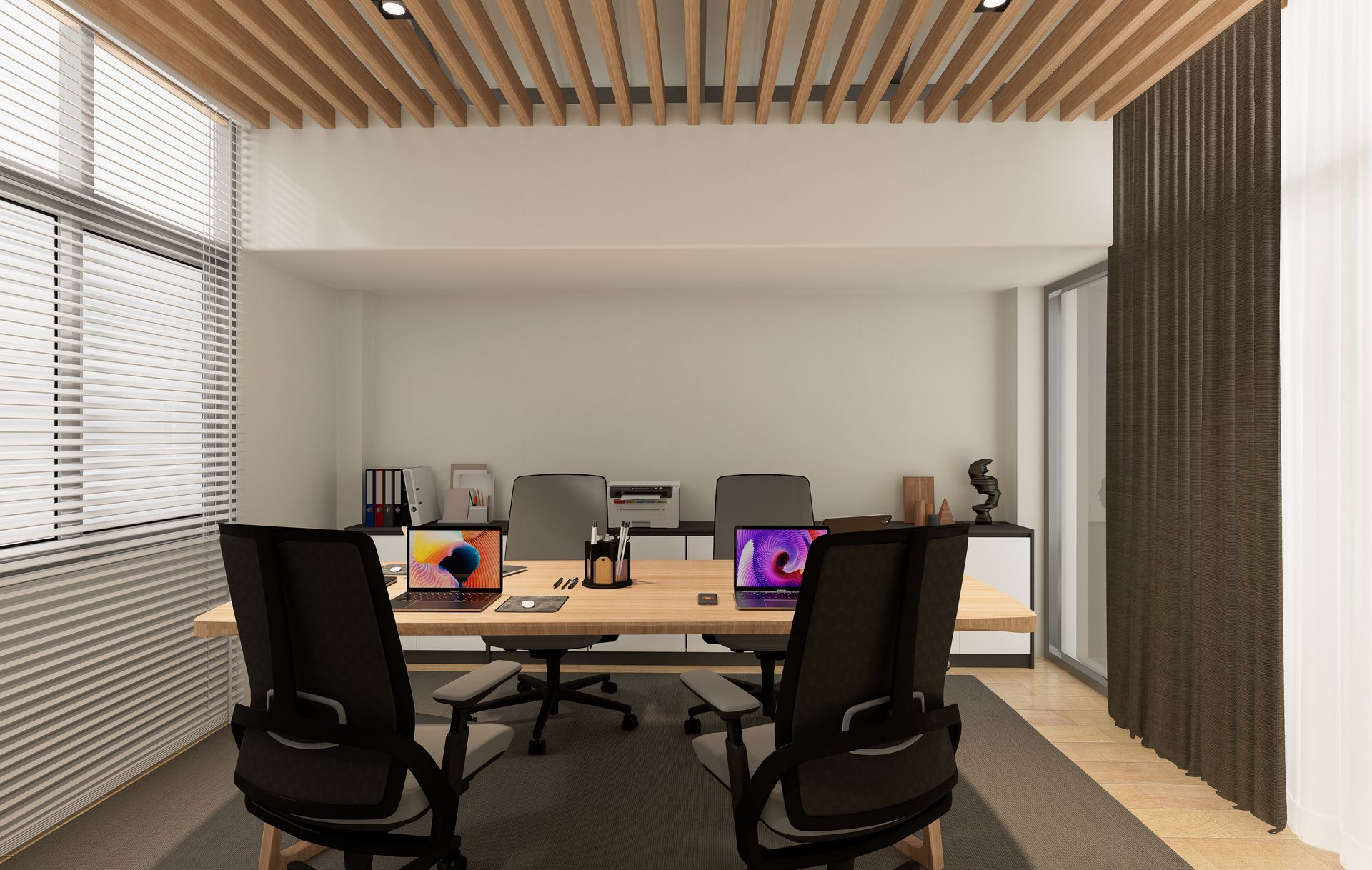 Office with desks, chairs, laptops, and a wooden ceiling. A window is on the left, with drapes on the right.