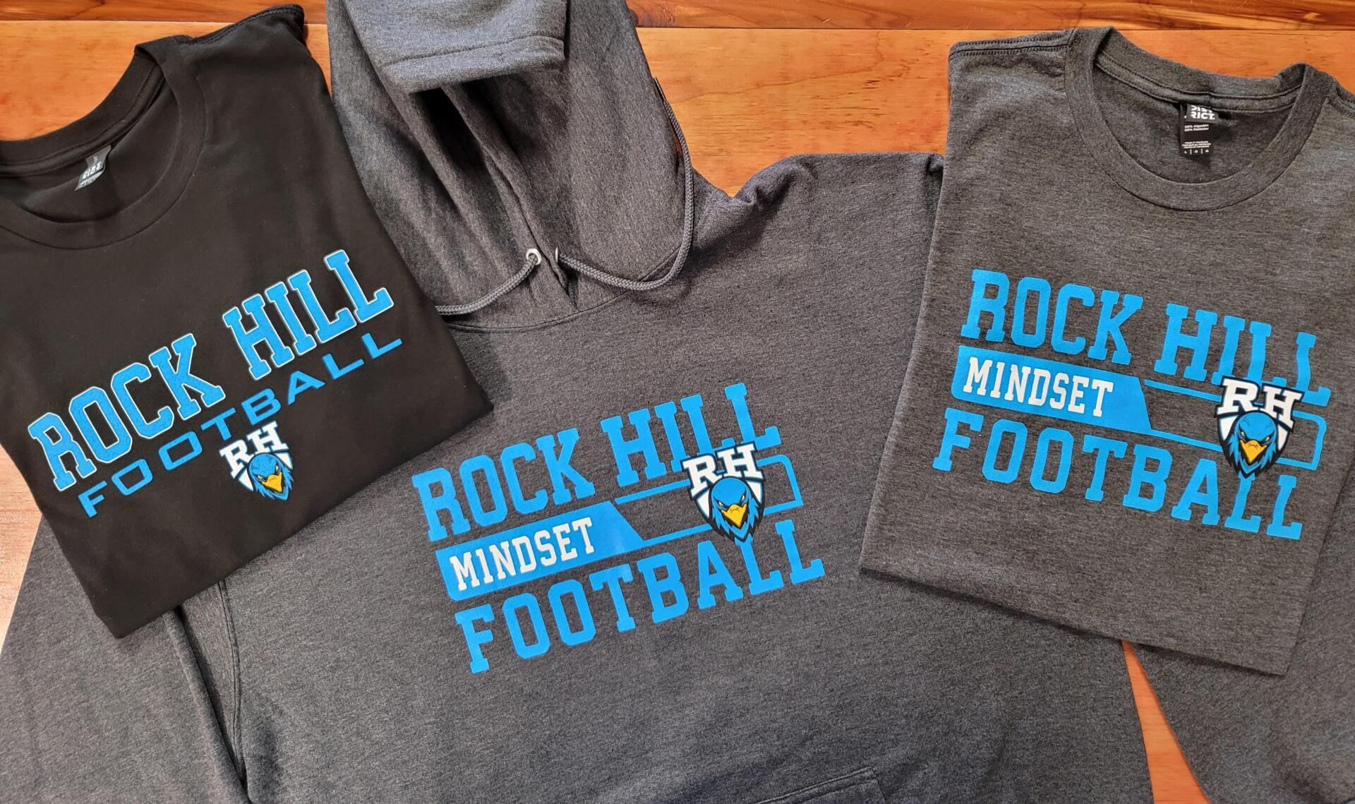 Rock Hill Mindset Football apparel: black tee, gray hoodie, and gray tee with blue and white logo.