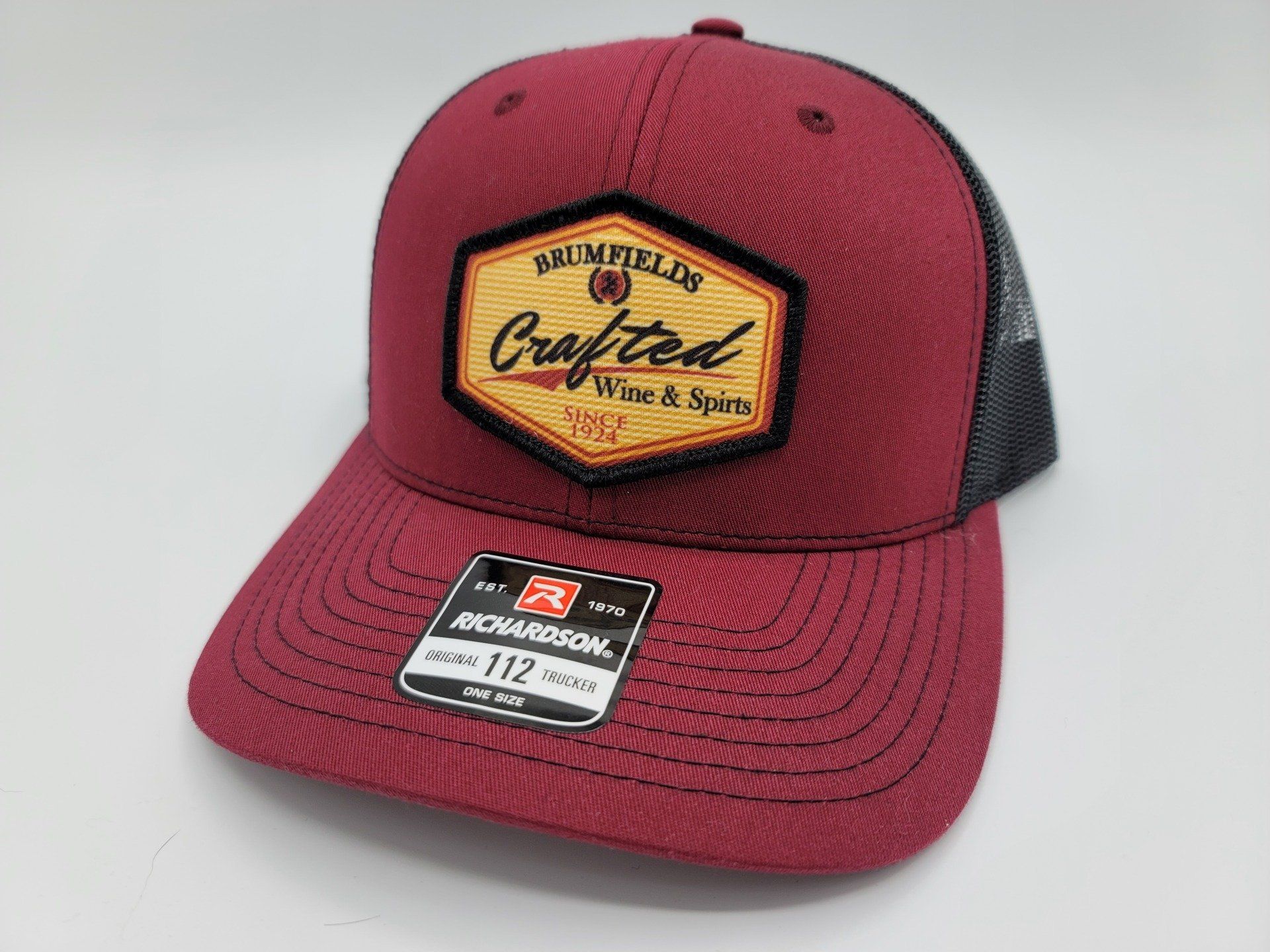 Maroon and black Richardson 112 trucker hat with