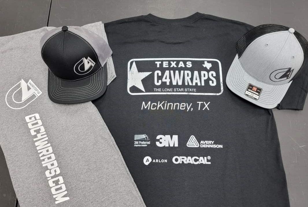 Gray and black t-shirts and hats with