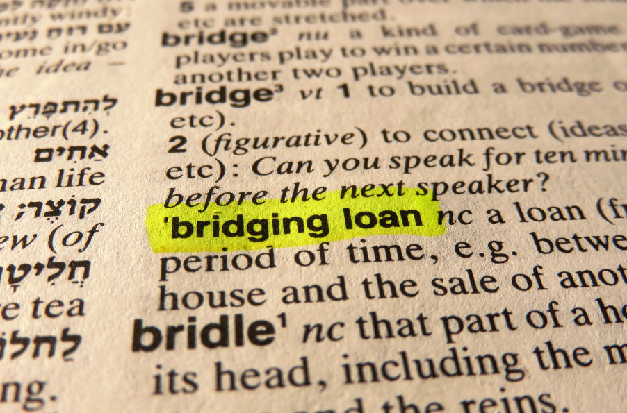 The word bridge loan is highlighted in a dictionary