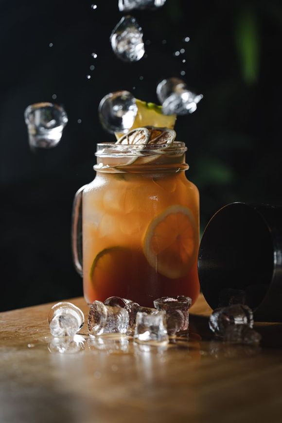 Cocktail drink in a jar with lemons