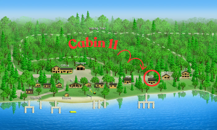 Colorful lakeside cabin map with forest, docks, and red “Cabin II” label circled in the center