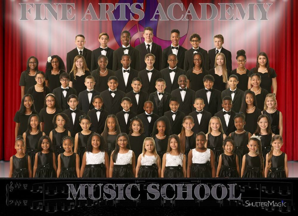 A large group of children are posing for a picture at the fine arts academy music school