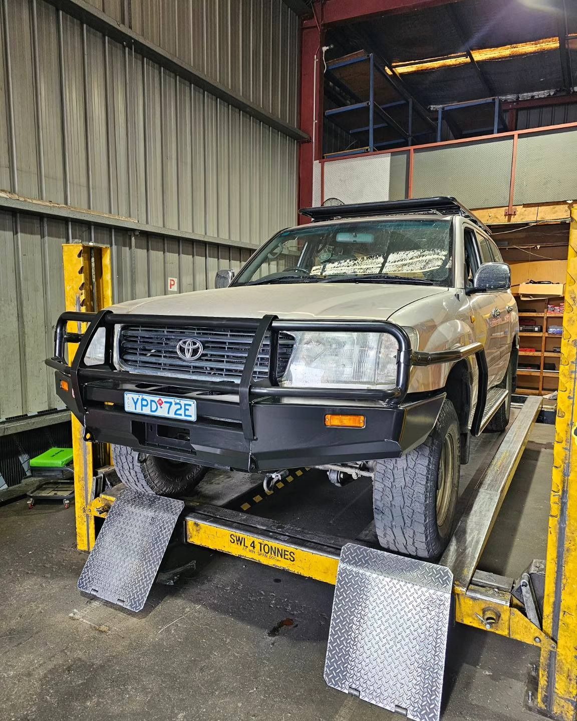 Silver SUV on a Vehicle Lift in Canberra