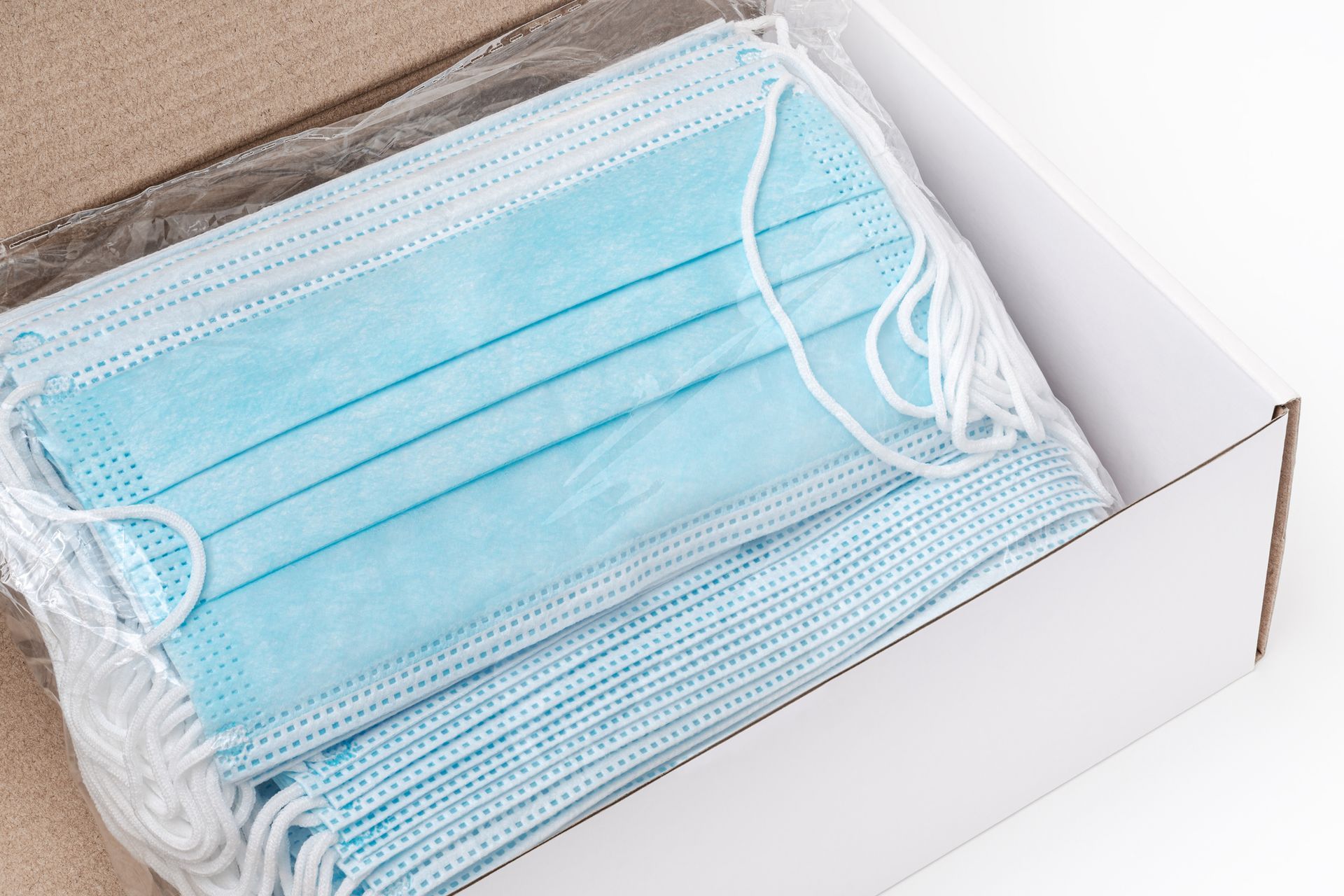 Box of blue disposable face masks.
