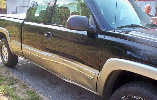 Car Door Dent — Frankfort, MI — Precision Collision & Auto Glass Of Frankfort