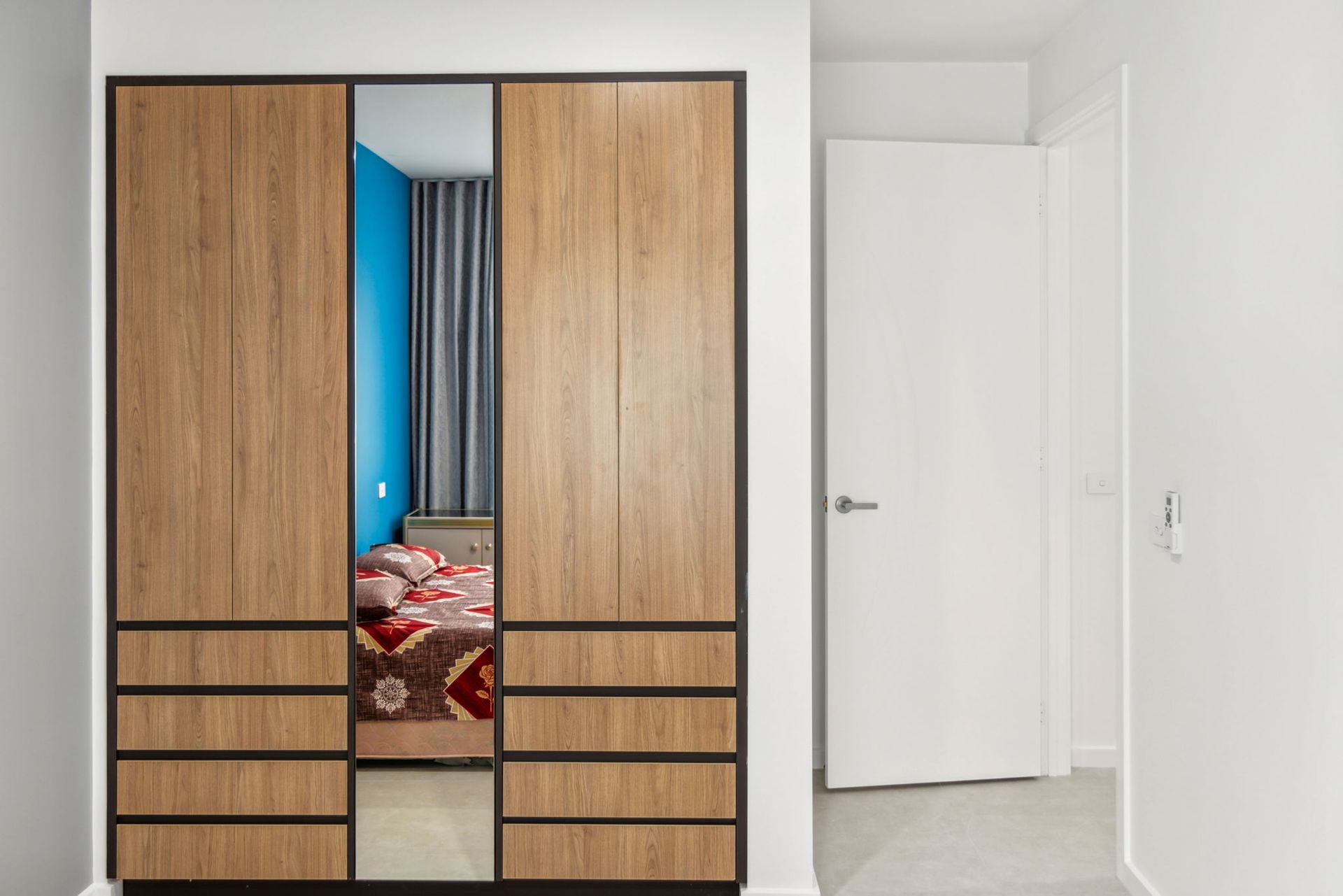 Wooden Wardrobe With Mirror and Black Trim — ASM Joinery In Fyshwick, ACT