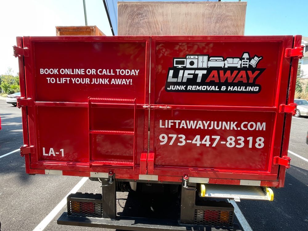 Red Lift Away junk removal truck with text