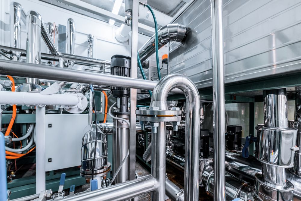There Are A Lot Of Pipes And Tubes In This Factory — NQ Fridge & Freezer Seals In Manoora, QLD