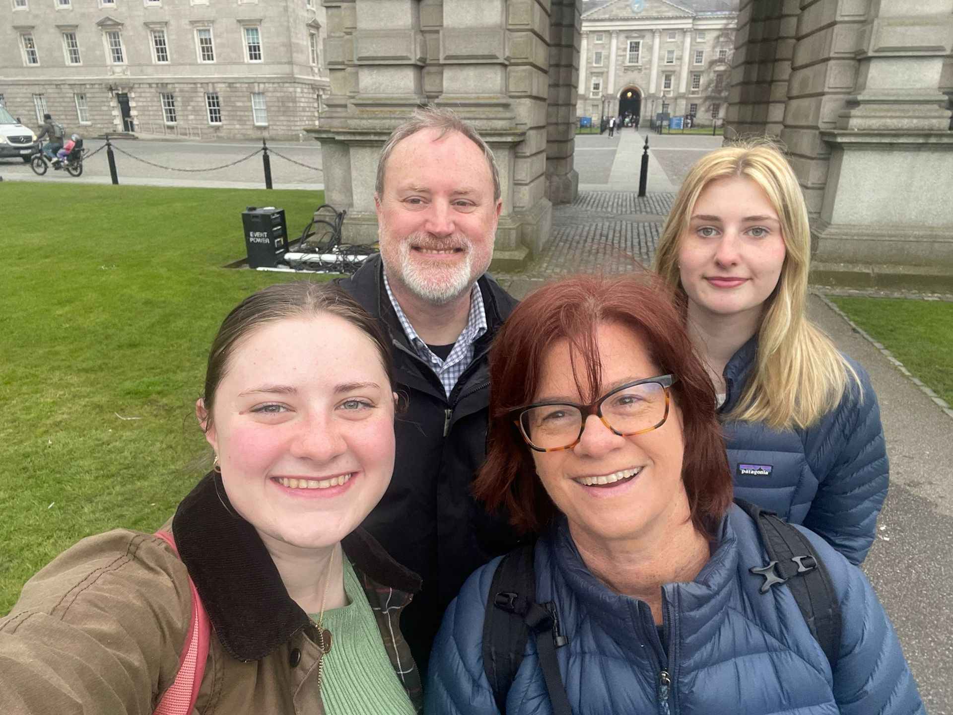 Dianna Suggs Family Travel to Ireland in front of the Trinity College
