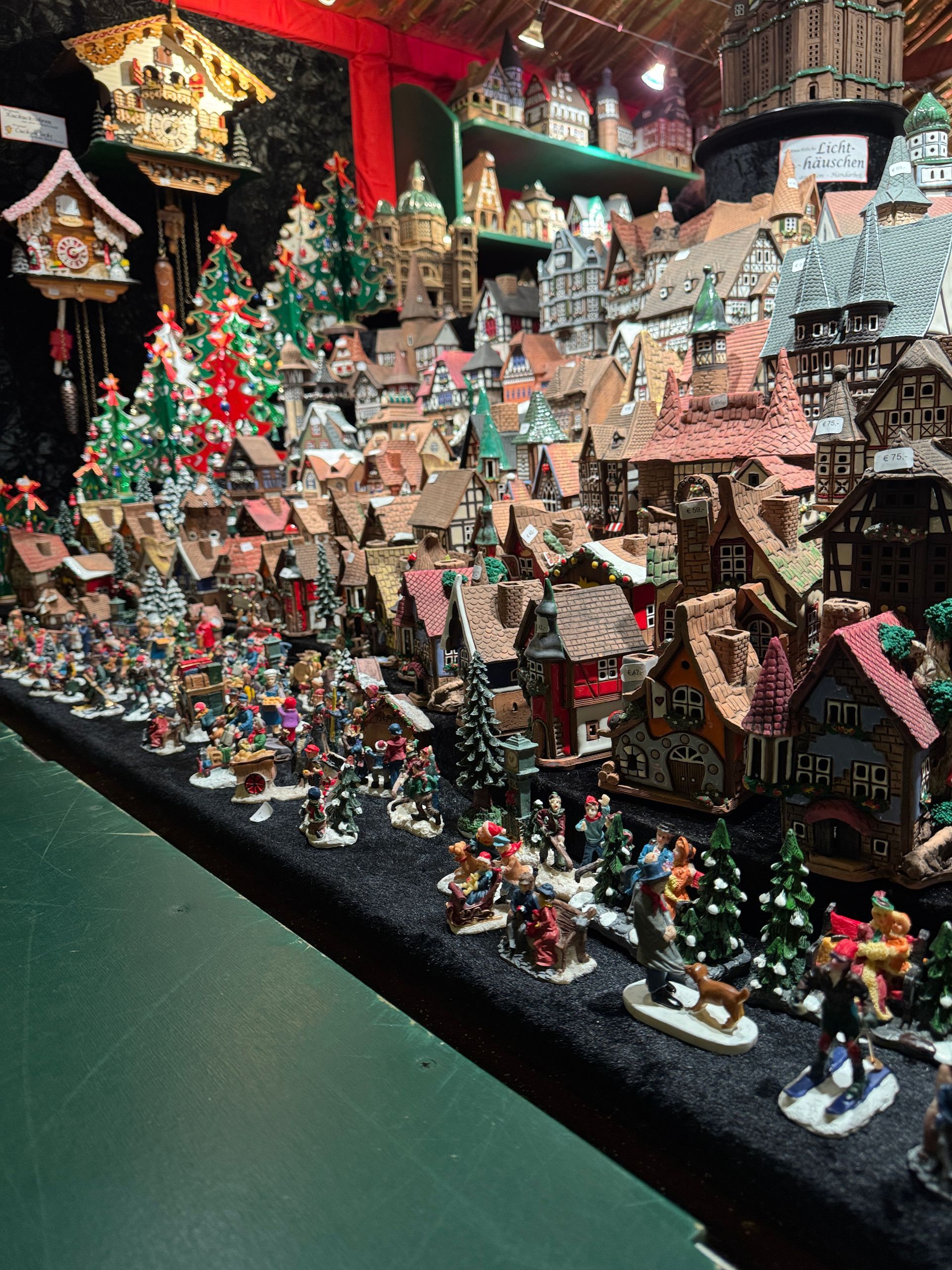 A Christmas Market stall selling ceramic mini houses