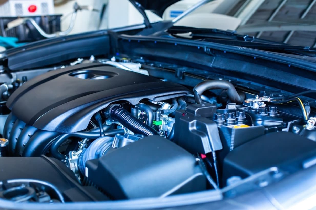 The Engine Of A Car Is Shown With The Hood Open — Brad's Auto Electrical in Mareeba, QLD