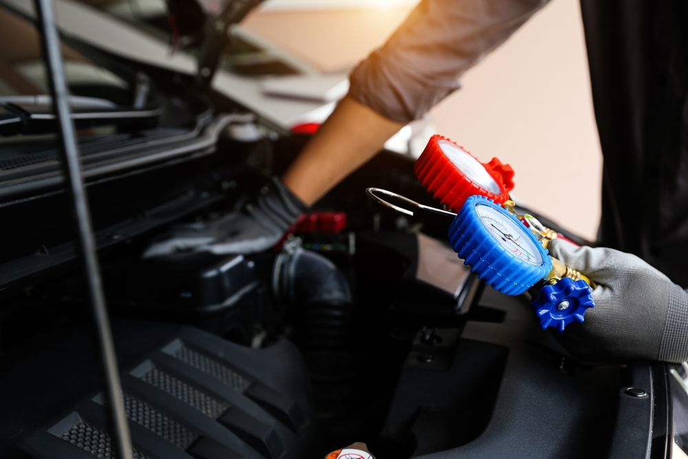 A Close Up Of A Car A/c Control With A Temperature Of 24.6 Degrees Celsius — Brad's Auto Electrical in Mareeba, QLD