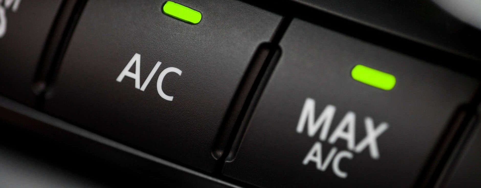 Car AC Refrigerant Service in Malden, MA Car AC Refrigerant Service in Malden, MA, picture of A/C buttons in a car