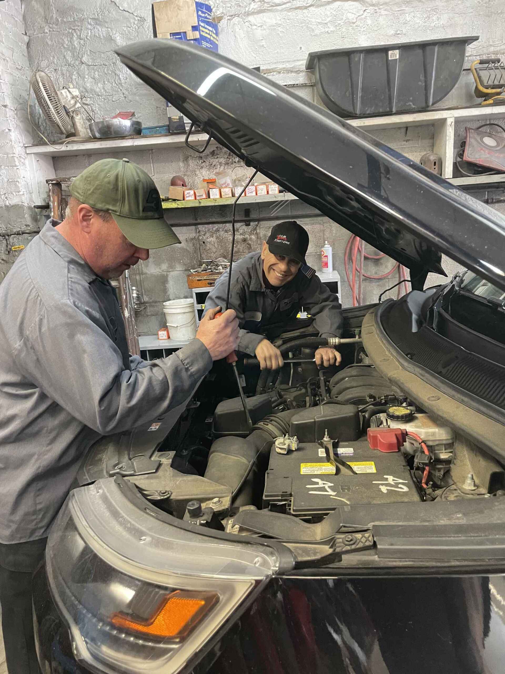 Mechanics doing A/C Repair