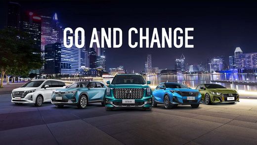 Five customized sports cars lined up at night with city skyline and bold text “GO AND CHANGE”