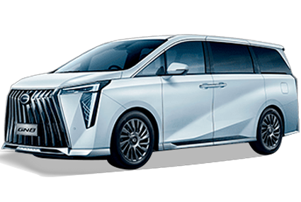 White luxury minivan with chrome grille and tinted windows, shown in side-front view.