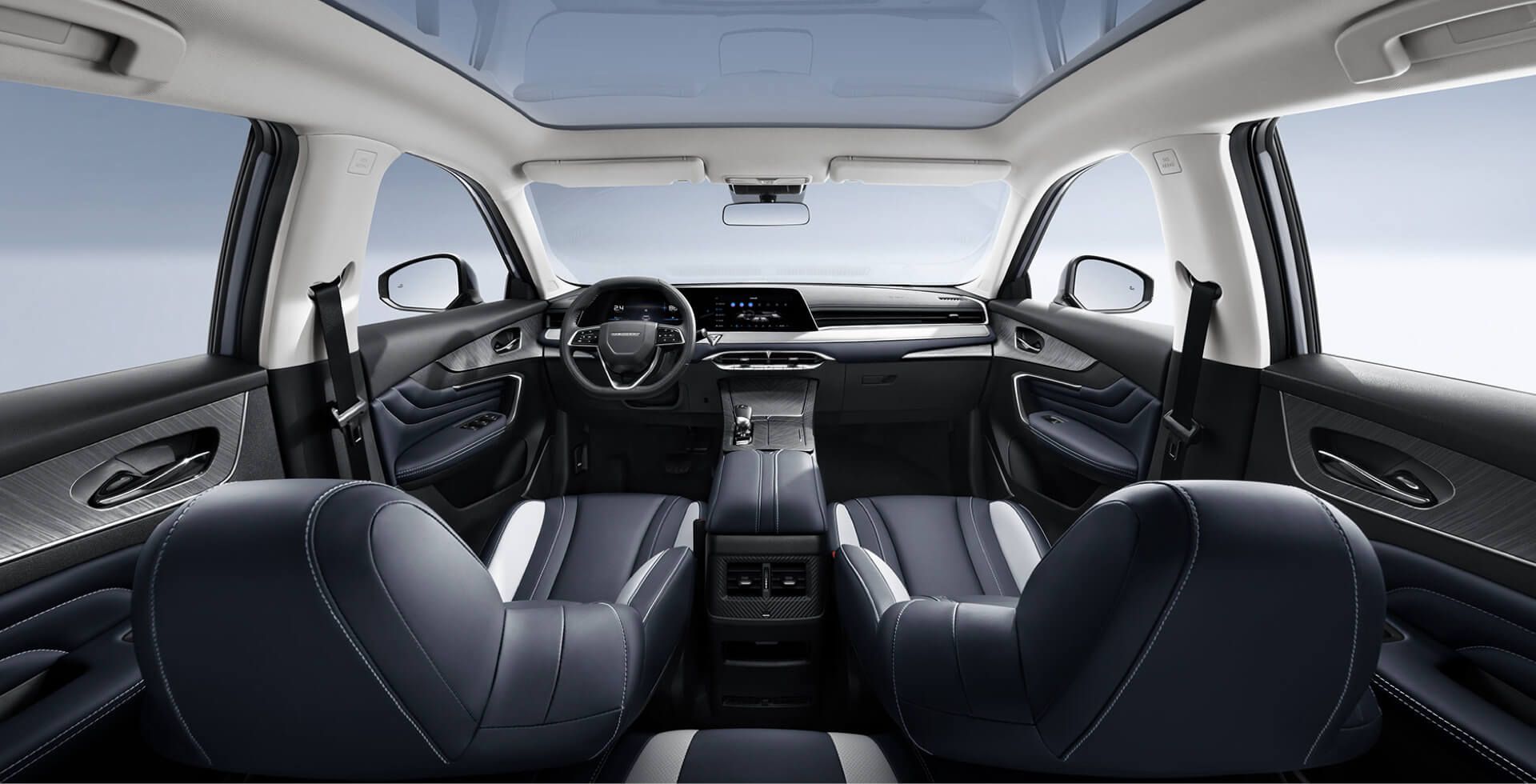 Interior view of a car with dark blue leather seats, panoramic sunroof, and a black dashboard.