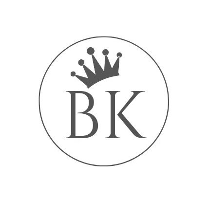 A logo with the letter bk and a crown in a circle.