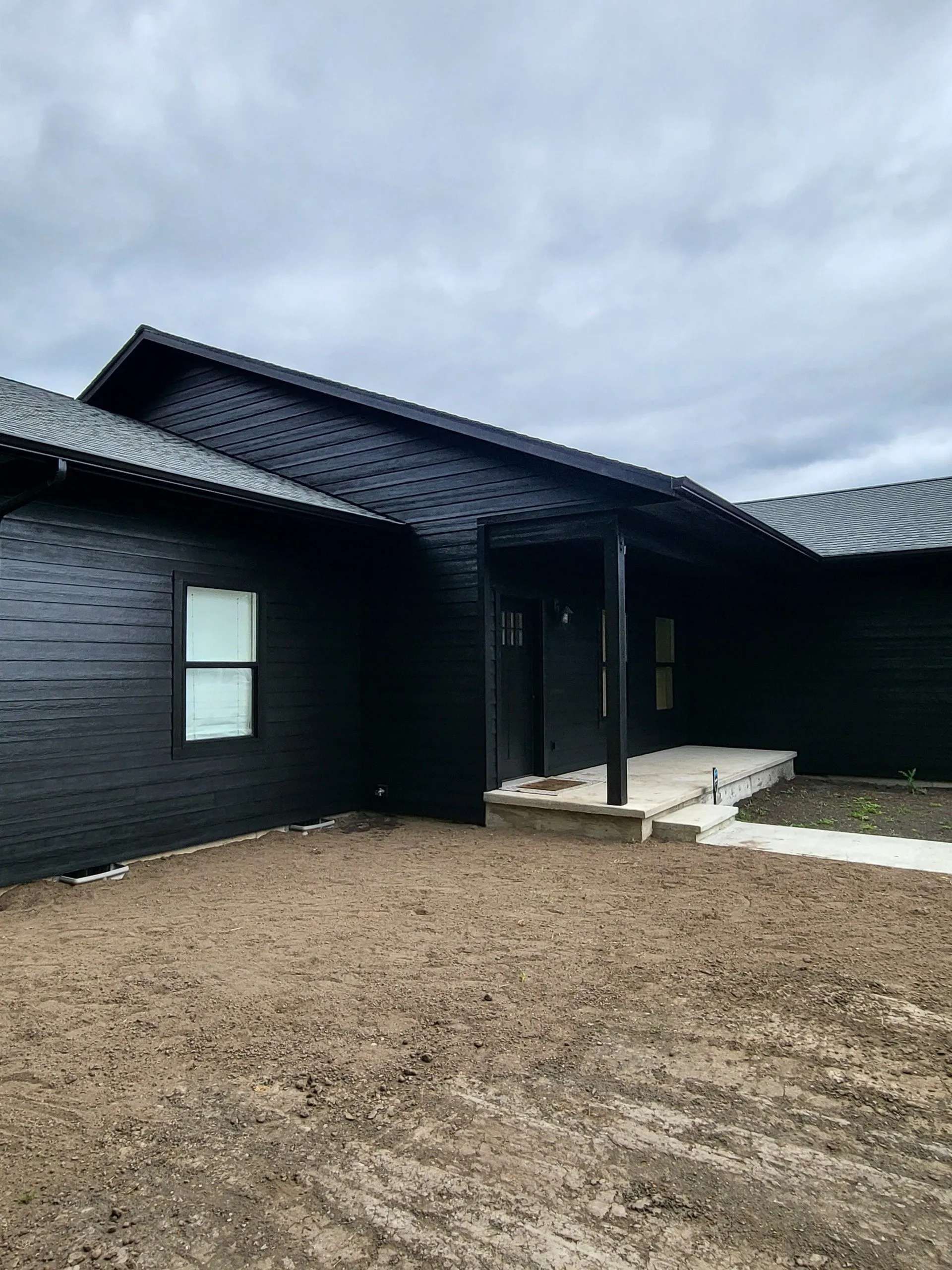 Completed new construction home with professionally painted exterior in Centralia, WA