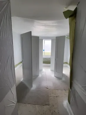 Freshly painted interior doors drying before installation