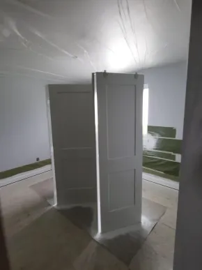 Finished interior doors with professionally painted millwork