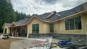 Residential new construction with freshly painted siding and trim