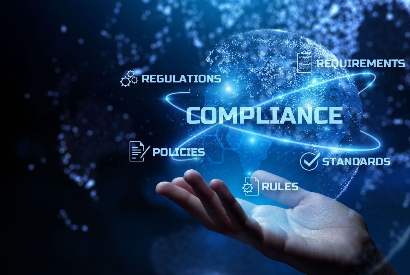 Standards & Accreditations - Hand holding a glowing globe representing compliance, standards, and regulations.