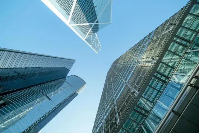 Commercial & Public Buildings - A view of modern skyscrapers representing the commercial and public building industry.