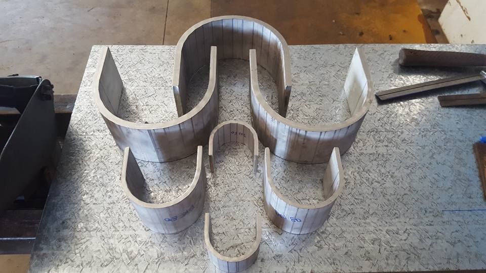 A Bunch of Pieces of Metal Are Sitting on a Table — Roll Press NT In Kununurra, WA