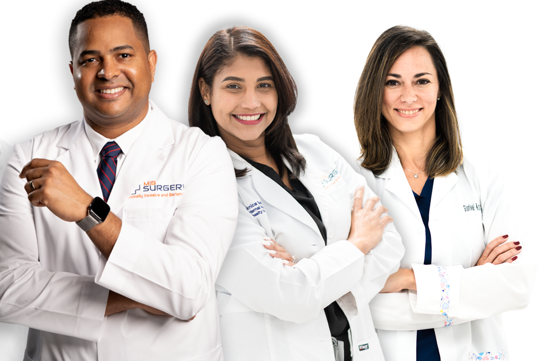 A group of doctors standing next to each other with their arms crossed.