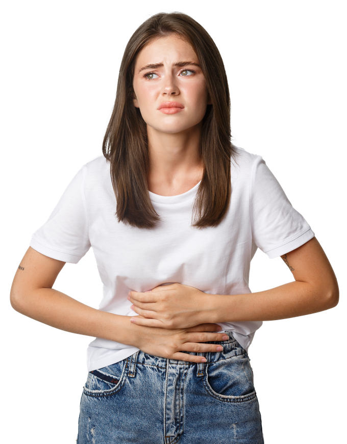 A young woman is holding her stomach in pain.