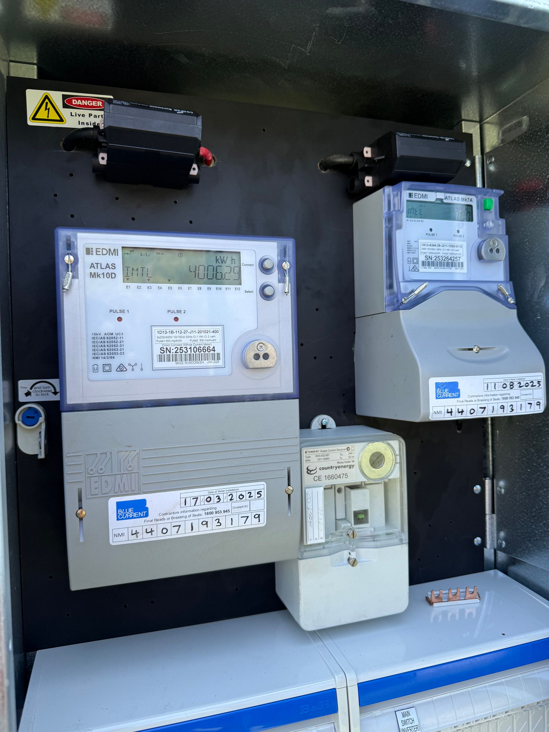 Electrical Meters Mounted Inside a Metal Cabinet — CDT Electrical in Lennox Head, NSW