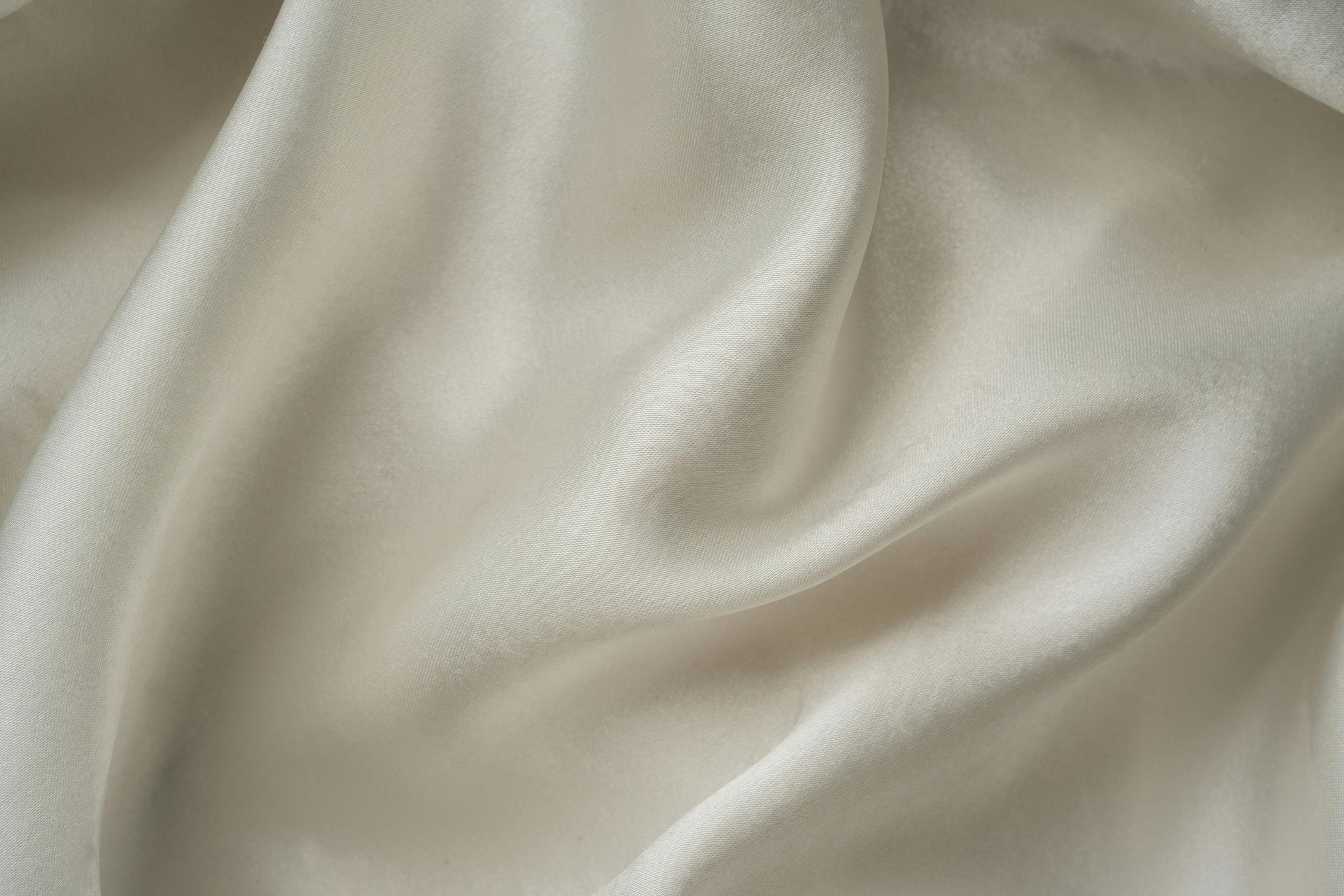 Off-white, rippled fabric.