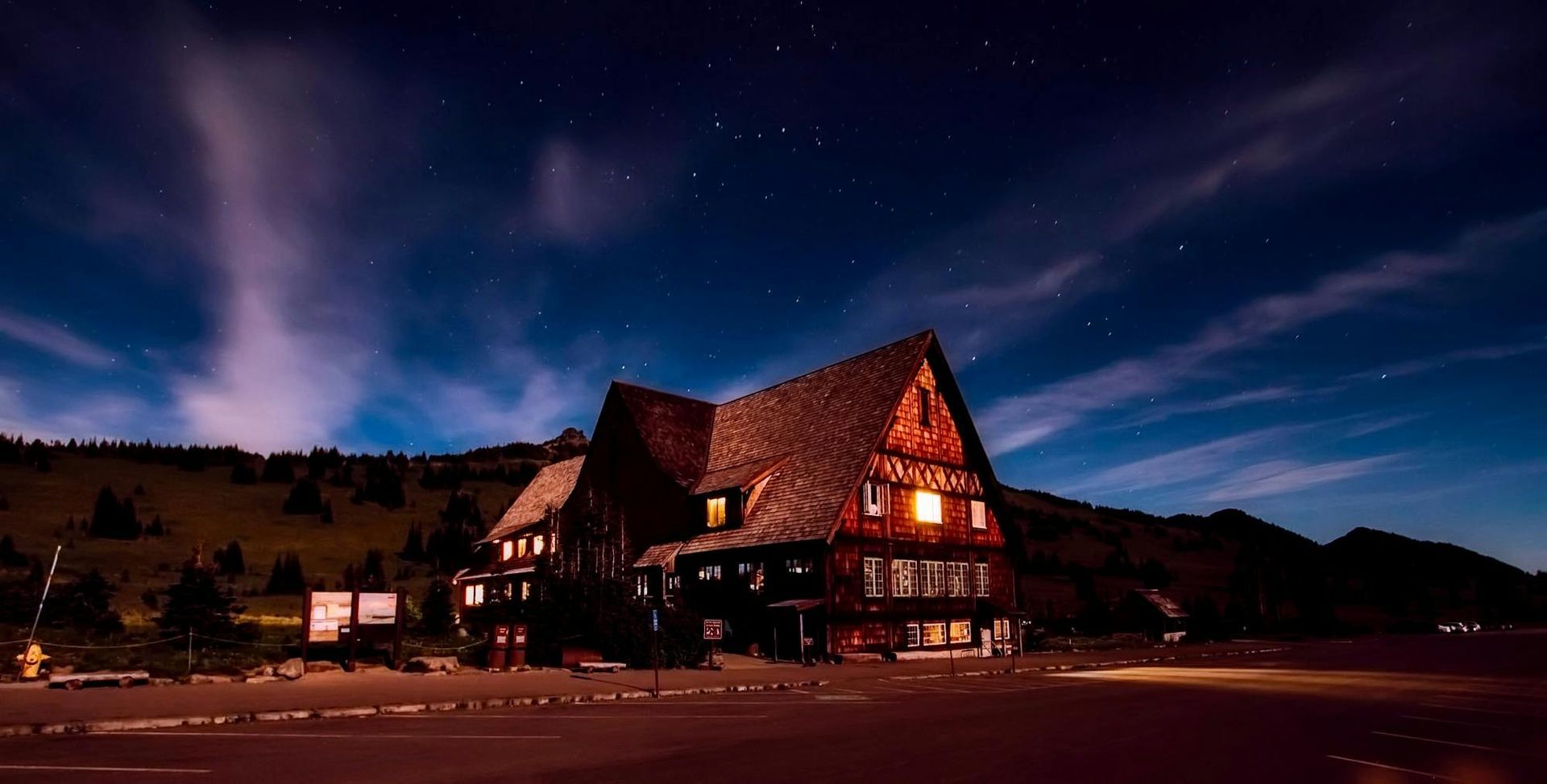 Big Bear Lake home with professional exterior lighting installation at night