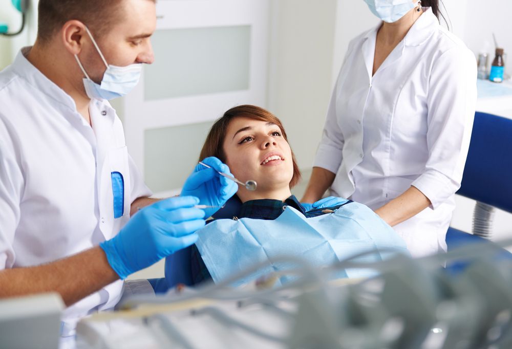 A dentist and patient— Twin Peaks Finance In Helensvale, QLD