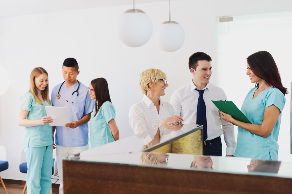 Doctors and nurses in medical suite— Twin Peaks Finance In Helensvale, QLD