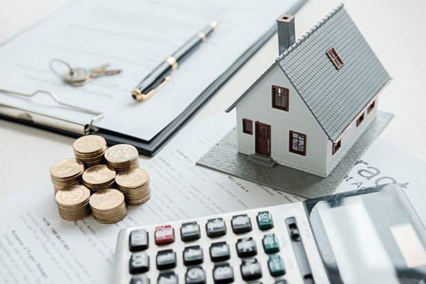 Model house and money— Twin Peaks Finance In Helensvale, QLD