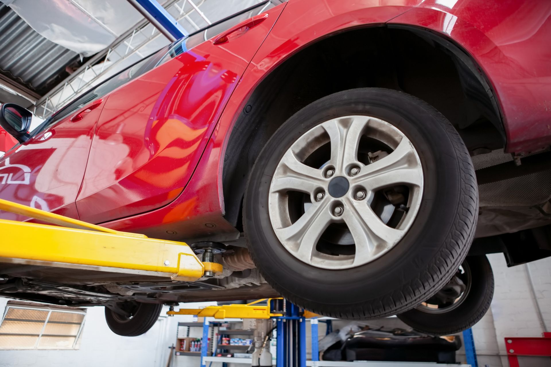 Hydraulic Car Lift in a Workshop — Perth, WA — Advantech Mobile Auto Electrics