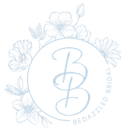 Gold "BB" calligraphy within a floral wreath; "Bedazzled Bridal" text in blue.