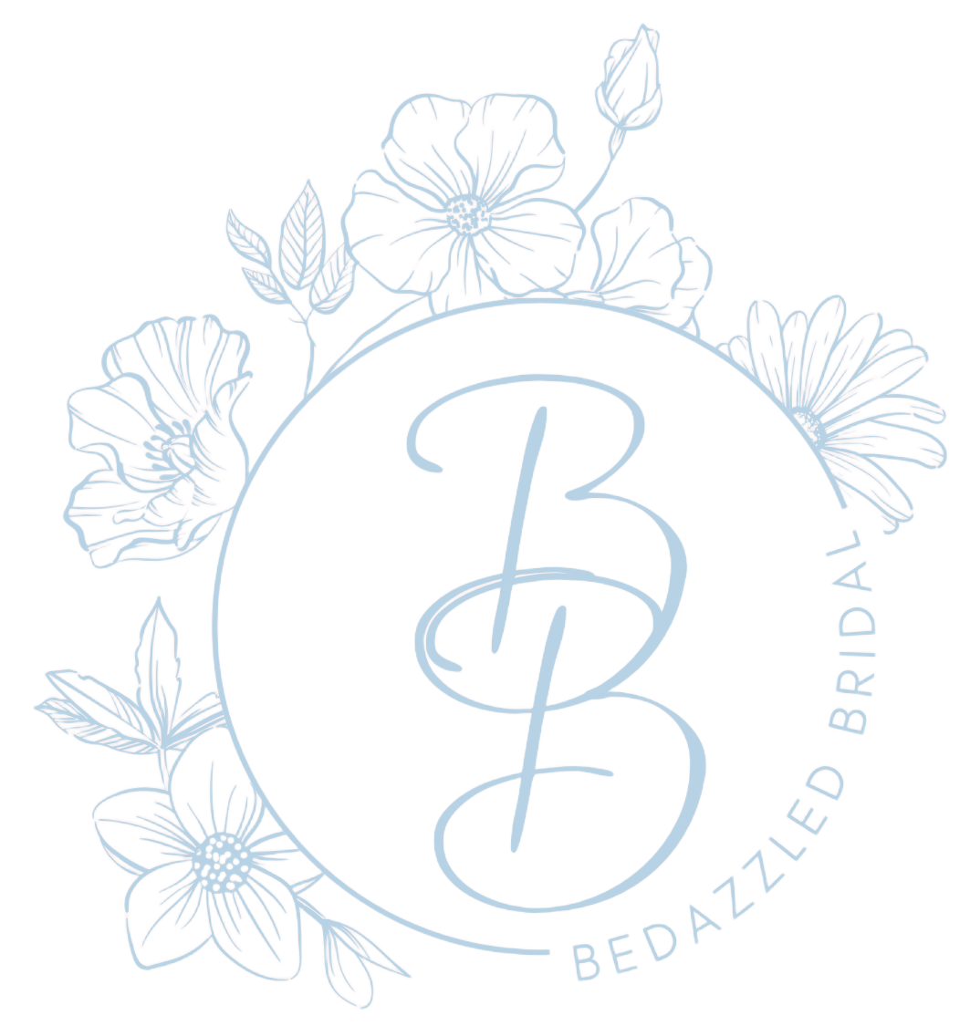 Gold "BB" calligraphy within a floral wreath; "Bedazzled Bridal" text in blue.