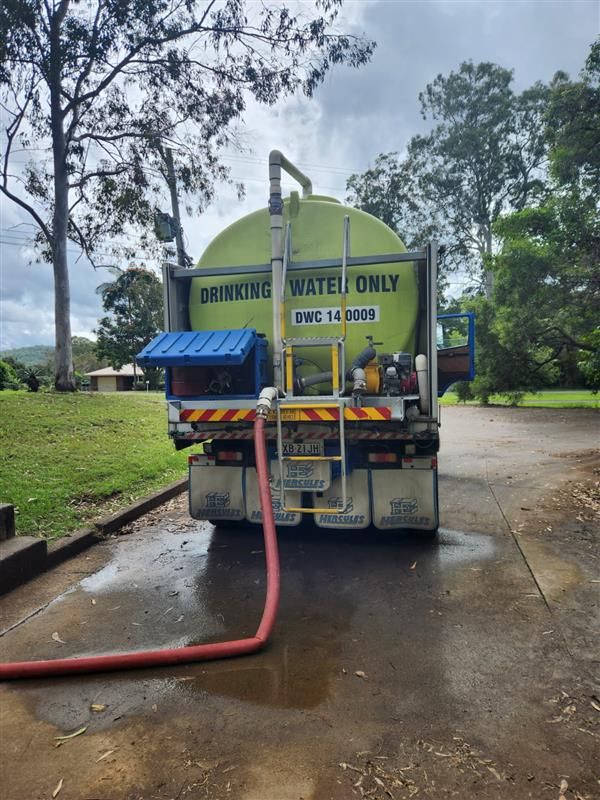 Rear Of Drinking Water Truck With Hose Coming Out — Hinterland Water Cartage in Mooloolah Valley, QLD