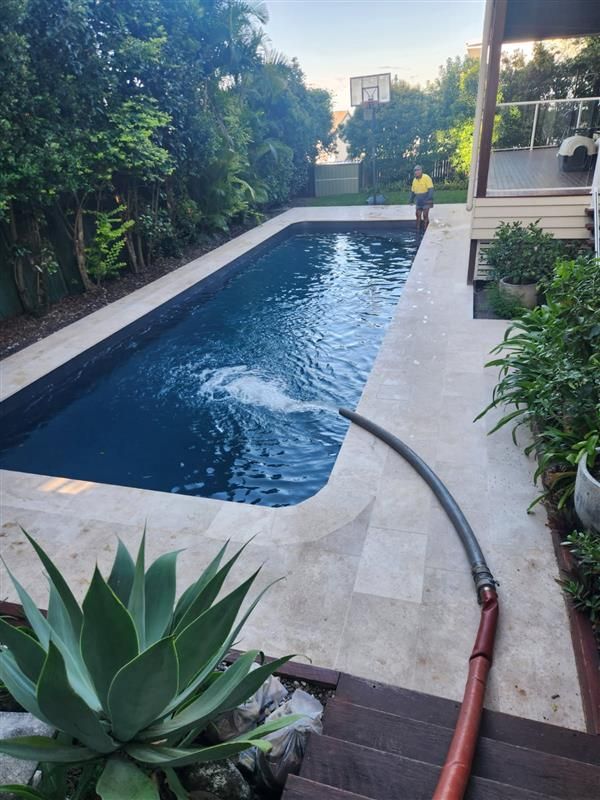 Hose Filling Swimming Pool — Hinterland Water Cartage in Mooloolah Valley, QLD