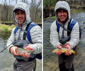 Man fly fishing, holding trout in each hand. Standing in a stream, wearing waders and hooded jacket.