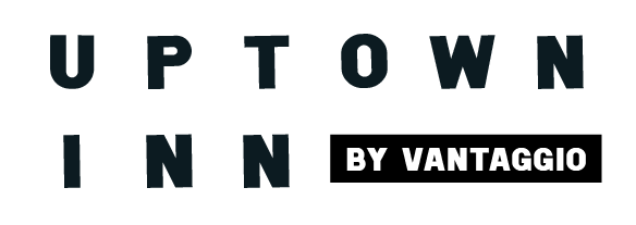 A black and white logo for uptown inn