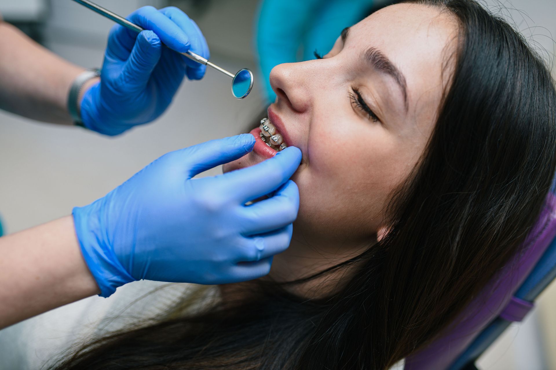 A Young Girl Is Having a Denture Adjustment at Her Dentist — Mount Waverley, VIC — Mount Waverley Dental