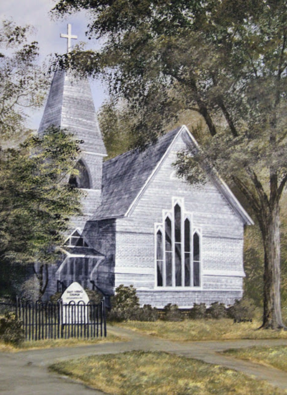 White church with steeple and cross amid trees, viewed from a quiet roadside.