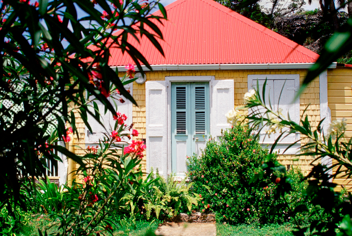 Bungalow in Belleville that has a new metal tile roof on it.